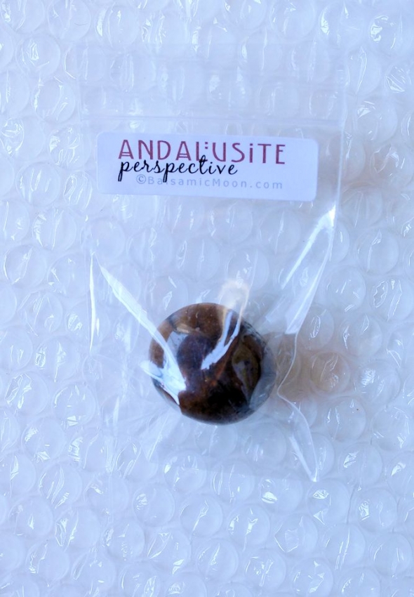 andalusite tumbled stone in bag