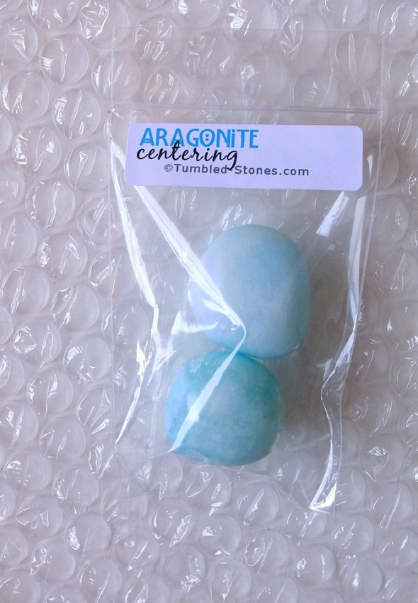 blue aragonite tumbled stones in bag