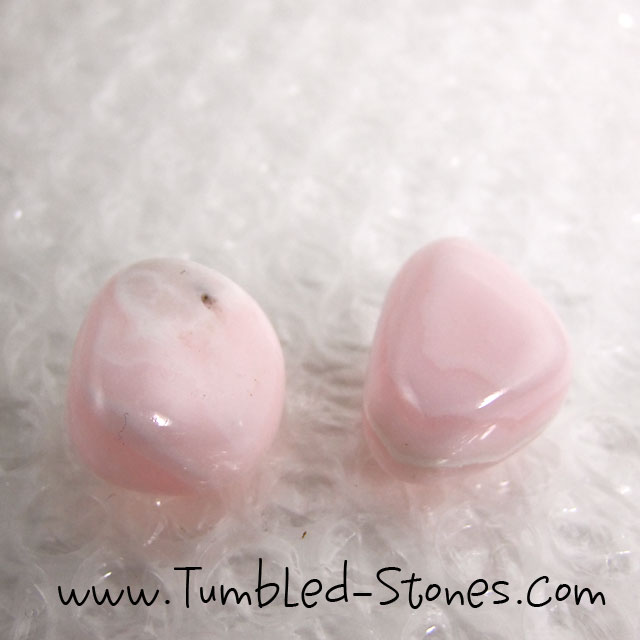 pink calcite tumbled stones