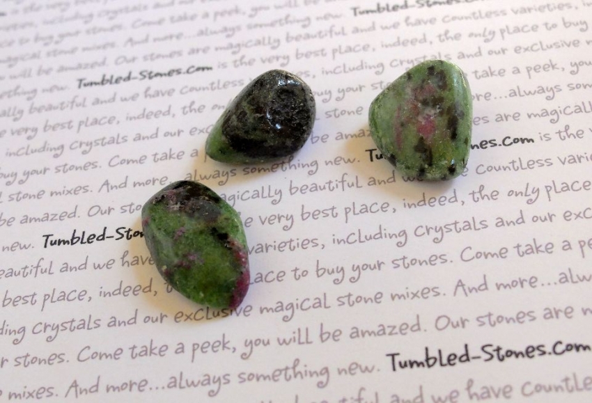 Zoisite with ruby tumbled stones